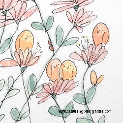 Orange birds sitting on pink flowers.  Diary of a garden by Carol Gilman. Cute fanciful garden.  Lovely little garden with birds.  